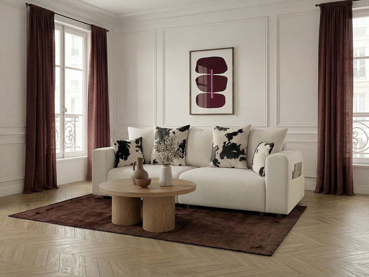 Sofa rozkładana SIDONIE z poduszkami w krowie łaty